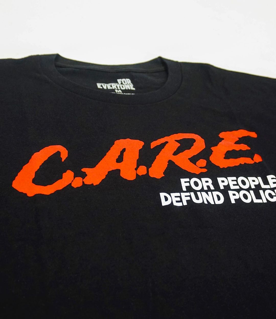 CARE For People Defund Police Tee